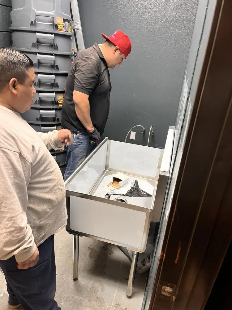 Commercial plumbing and sink installation in Melrose